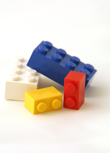 childhood toys like these legos can block up a toilet very quickly